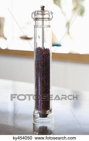 Pepper mill at a kitchen counter View Large Photo Image Stock Image - Pepper mill at a kitchen counter. Fotosearch