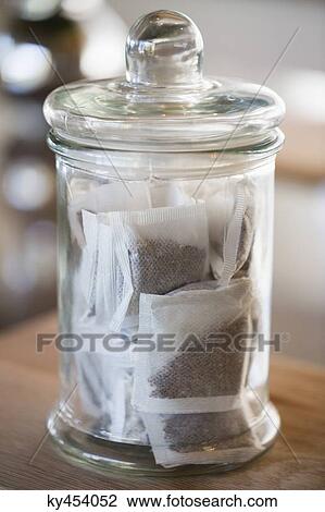 Teabags in a jar at a kitchen counter View Large Photo Image Stock Image - Teabags in a jar at a kitchen counter. Fotosearch