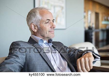 Close-up of a businessman thinking View Large Photo Image Stock Image - Close-up of a businessman thinking. Fotosearch