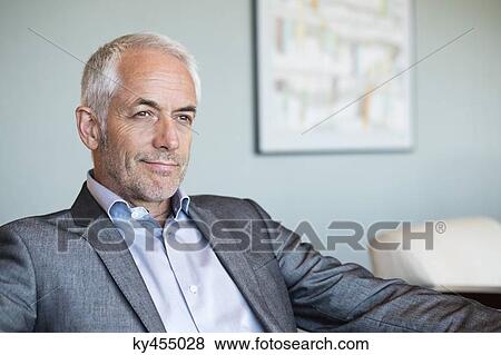 Stock Photo - Close-up of a businessman thinking. Fotosearch