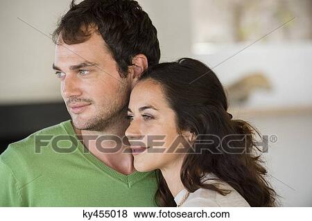 Stock Photo - Close-up of a couple smiling. Fotosearch