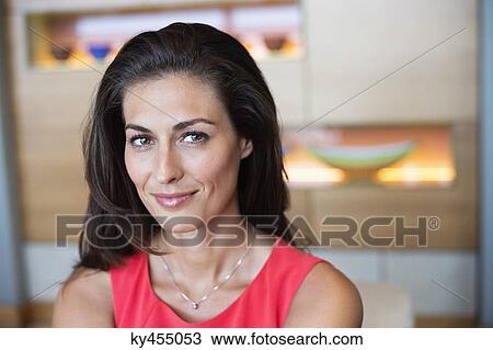 Portrait of a beautiful woman smiling View Large Photo Image Stock Image - Portrait of a beautiful woman smiling. Fotosearch