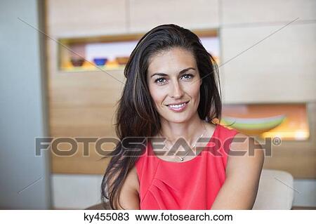 Portrait of a beautiful woman smiling View Large Photo Image Stock Image - Portrait of a beautiful woman smiling. Fotosearch