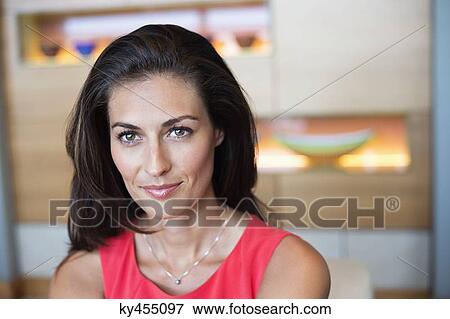 Stock Photo - Portrait of a beautiful woman smiling. Fotosearch
