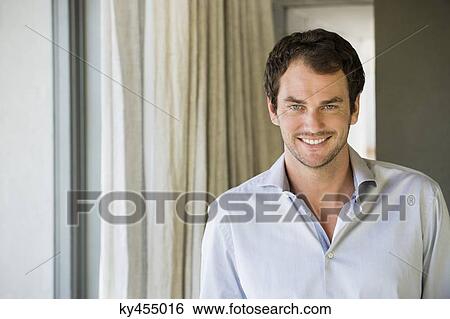 Portrait of a man smiling View Large Photo Image Stock Photograph - Portrait of a man smiling. Fotosearch