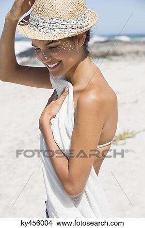 Beautiful woman enjoying on the beach View Large Photo Image Picture - Beautiful woman enjoying on the beach. Fotosearch