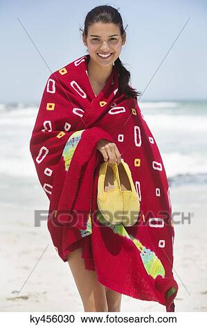 Beautiful woman enjoying on the beach View Large Photo Image Stock Image - Beautiful woman enjoying on the beach. Fotosearch