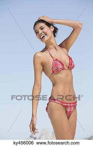 Beautiful woman enjoying on the beach View Large Photo Image Stock Photograph - Beautiful woman enjoying on the beach. Fotosearch
