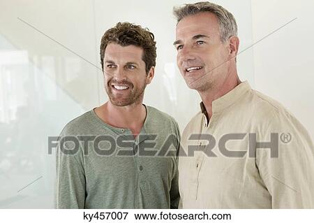 Stock Photo - Father and son smiling. Fotosearch