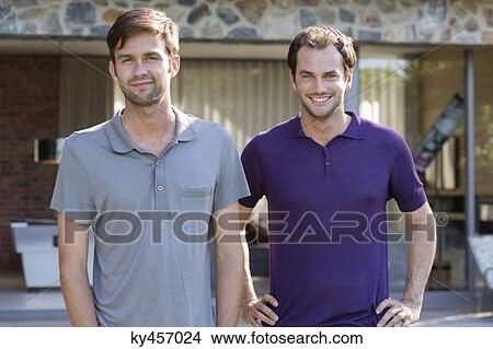 Picture - Portrait of two male friends smiling. Fotosearch