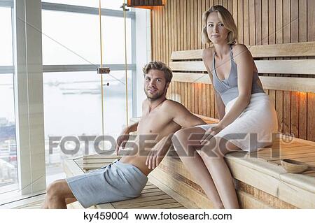 Couple in a sauna View Large Photo Image Picture - Couple in a sauna. Fotosearch