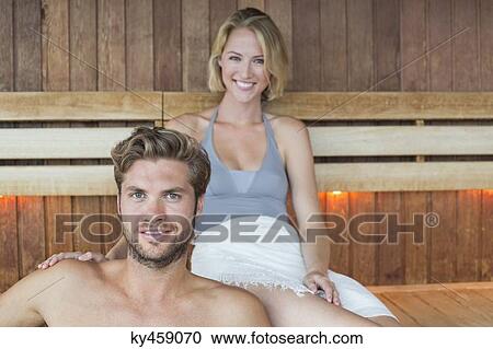 Portrait of a couple in a sauna View Large Photo Image Stock Image - Portrait of a couple in a sauna. Fotosearch
