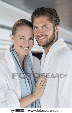 Portrait of a smiling couple in bathrobes at spa View Large Photo Image Stock Image - Portrait of a smiling couple in bathrobes at spa. Fotosearch