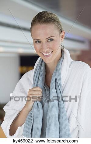 Portrait of a smiling woman in bathrobe at spa View Large Photo Image Stock Image - Portrait of a smiling woman in bathrobe at spa. Fotosearch