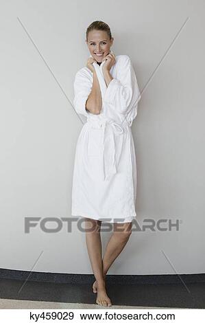 Portrait of a smiling woman in bathrobe at spa View Large Photo Image Stock Photo - Portrait of a smiling woman in bathrobe at spa. Fotosearch