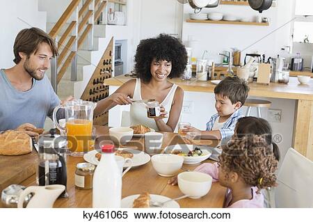 Family at breakfast table View Large Photo Image Stock Photography - Family at breakfast table. Fotosearch
