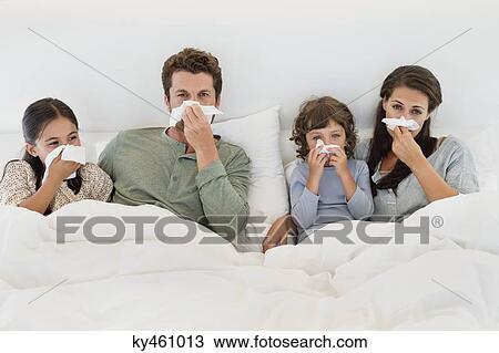 Family suffering from cold View Large Photo Image Stock Image - Family suffering from cold. Fotosearch