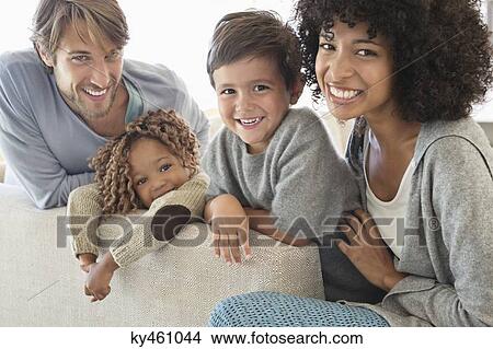 Picture - Portrait of a couple smiling with their children. Fotosearch