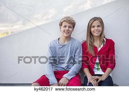 Two friends smiling View Large Photo Image Stock Photo - Two friends smiling. Fotosearch