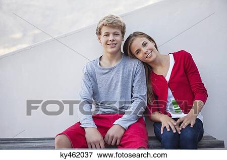 Two friends smiling View Large Photo Image Stock Photo - Two friends smiling. Fotosearch