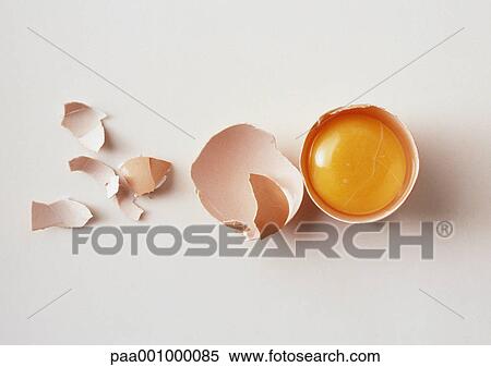 Stock Photography - Egg yolk in egg shell . Fotosearch