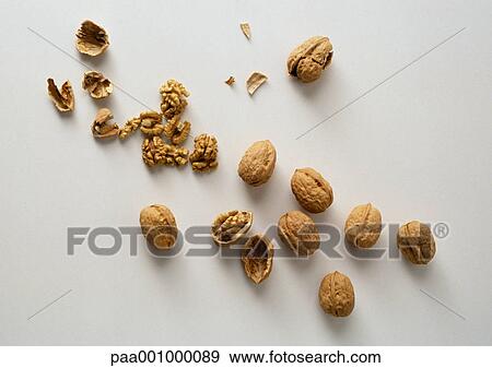 Scattered walnuts View Large Photo Image Stock Photo - Scattered walnuts. Fotosearch