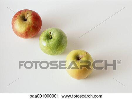 Three apples, red, green, yellow, in diagonal line, against white background View Large Photo Image Stock Image - Three apples, red, green, yellow, in diagonal line, against white background. Fotosearch