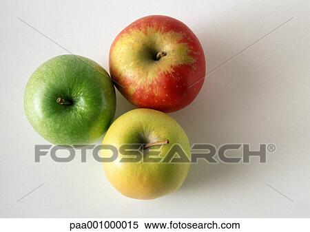 Three different apples, high angle view View Large Photo Image Stock Photography - Three different apples, high angle view. Fotosearch