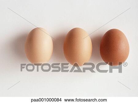 Three eggs against white background, close-up View Large Photo Image Picture - Three eggs against white background, close-up. Fotosearch