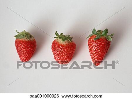 Three strawberries View Large Photo Image Stock Photograph - Three strawberries. Fotosearch