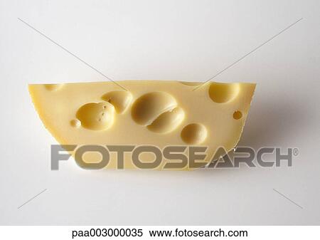 Stock Photography - Piece of swiss cheese, close-up. Fotosearch