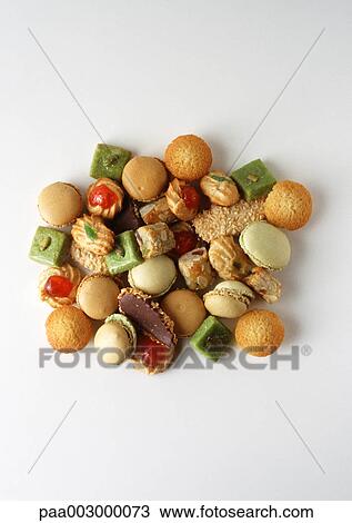 Stock Image - Pile of little pastries and sweets. Fotosearch