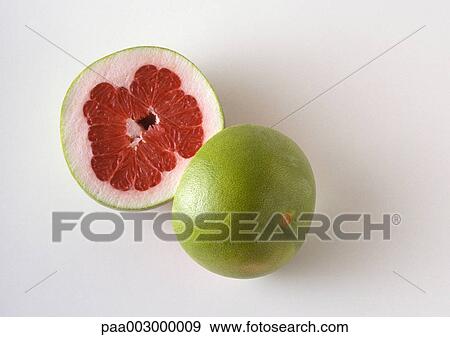 Pummelo cut in half View Large Photo Image Stock Photo - Pummelo cut in half. Fotosearch