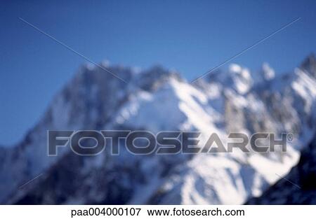 Stock Photo - blurred, landscape, landscapes, snowy, mountainous, hike, climb. Fotosearch