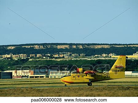 Airport view with plane in foreground. View Large Photo Image Stock Photo - Airport view with plane in foreground.. Fotosearch