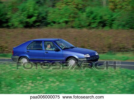 Blue car in motion. View Large Photo Image Stock Photography - Blue car in motion.. Fotosearch