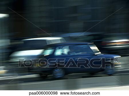 Fast moving cars, daytime, blurry. View Large Photo Image Stock Photo - Fast moving cars, daytime, blurry.. Fotosearch