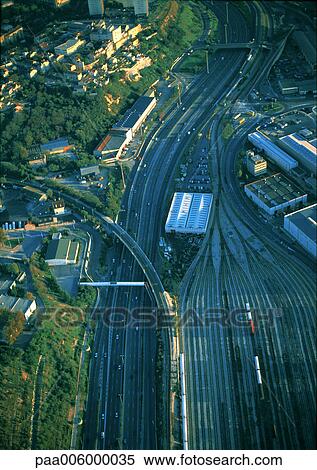 Freeway and trainyard, aerial view View Large Photo Image Stock Photography - Freeway and trainyard, aerial view. Fotosearch