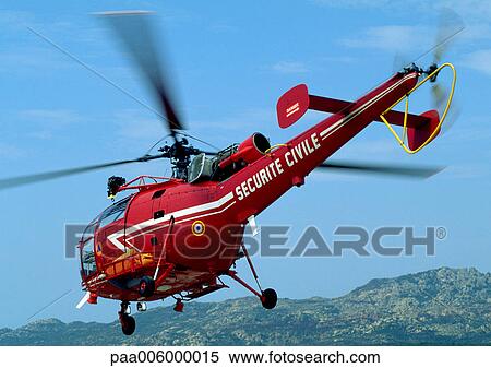 Helicopter in flight. View Large Photo Image Stock Photography - Helicopter in flight.. Fotosearch