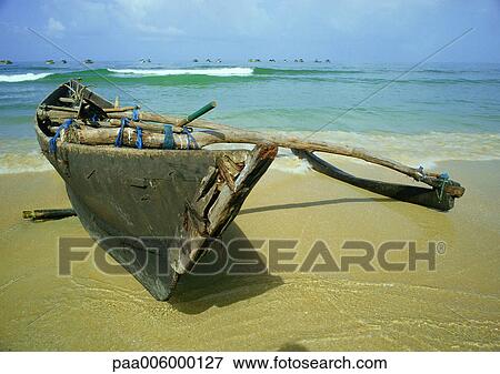 India, boat on shore of beach. View Large Photo Image Stock Photo - India, boat on shore of beach.. Fotosearch