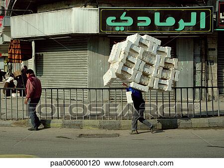 Jordan, man carrying styrofoam blocks. View Large Photo Image Stock Image - Jordan, man carrying styrofoam blocks.. Fotosearch