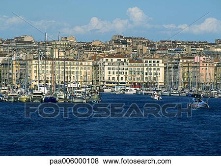 Stock Photo - Marina view from sea, with buildings.. Fotosearch