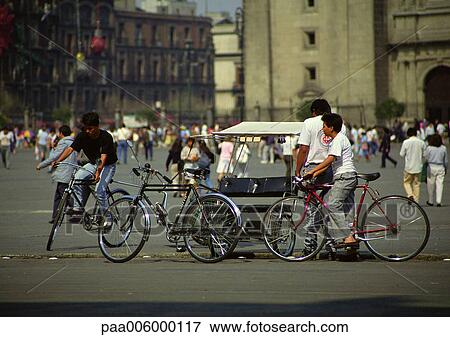 Mexico, people on bicycles in square View Large Photo Image Stock Photo - Mexico, people on bicycles in square. Fotosearch