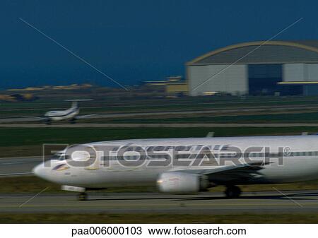 Plane at airport. View Large Photo Image Stock Image - Plane at airport.. Fotosearch
