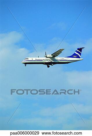 Plane flying, side view. View Large Photo Image Stock Photo - Plane flying, side view.. Fotosearch