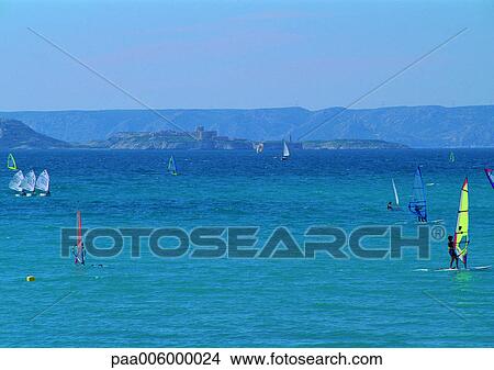 Seascape with windsailers. View Large Photo Image Picture - Seascape with windsailers.. Fotosearch