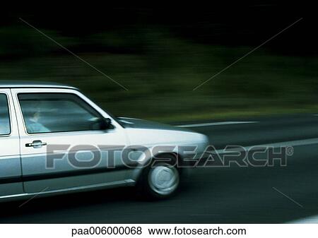 Side of car in motion. View Large Photo Image Stock Photo - Side of car in motion.. Fotosearch