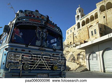 Syria, front of blue bus and ancient building View Large Photo Image Stock Photograph - Syria, front of blue bus and ancient building. Fotosearch