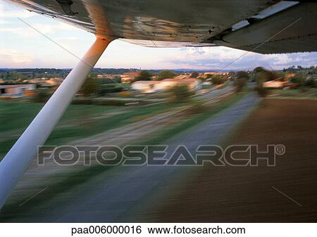 Underside of helicopter at takeoff. View Large Photo Image Stock Photograph - Underside of helicopter at takeoff.. Fotosearch