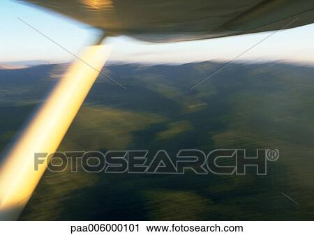 Underside of helicopter during flight. View Large Photo Image Stock Image - Underside of helicopter during flight.. Fotosearch